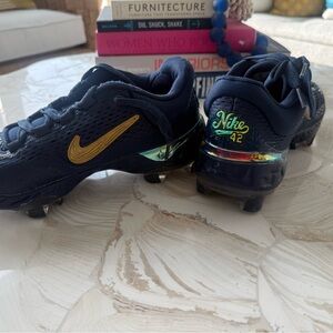 Nike Dark Blue and Gold Cleats